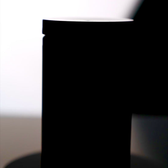 Video of White Lion Labs Non-Stim Pump Pre-Workout on pedestal, rotating to show the container