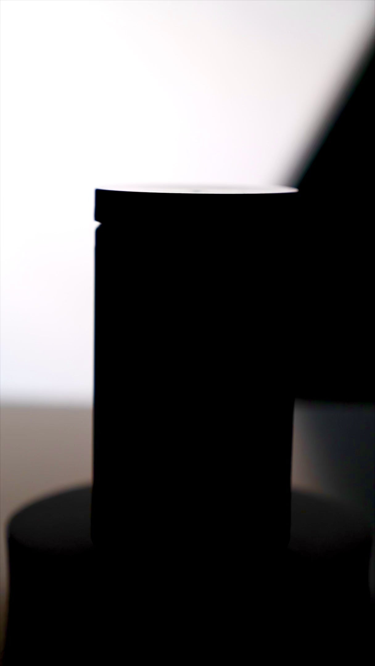 Video of White Lion Labs Non-Stim Pump Pre-Workout on pedestal, rotating to show the container